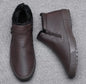Men's leather winter boots by BackupMyFilesNow.com with warm plush interior, high tops, casual style, and platform sole.