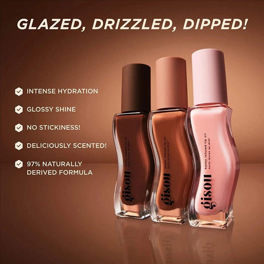 Gisou Limited Edition Milky Mocha Lip Oil Gloss with moisturizing, plumping, and exfoliating properties for soft lips.