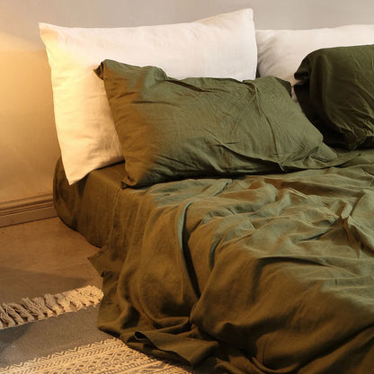 BackupMyFilesNow 100% pure linen 4-piece bed sheet set with flat sheet, fitted sheet, and pillowcases in flax color.