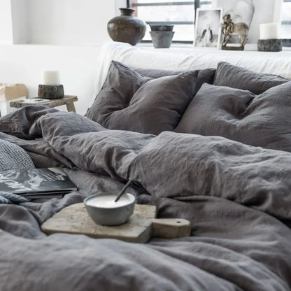 4-piece linen bed sheet set with flat sheet, deep pocket fitted sheet, and pillowcases in natural flax color by BACKUPMYFILESNOW.COM®.