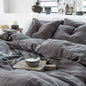 4-piece linen bed sheet set with flat sheet, deep pocket fitted sheet, and pillowcases in natural flax color by BACKUPMYFILESNOW.COM®.