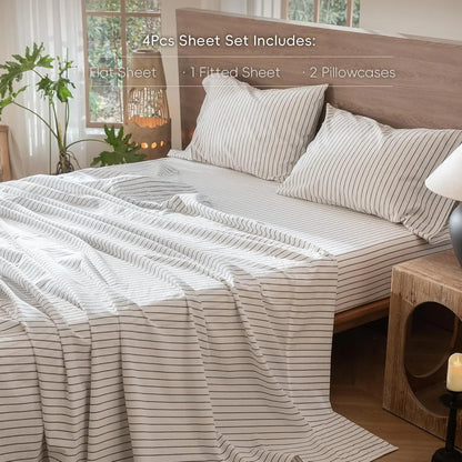 4-piece pure linen bed sheet set with flat sheet, deep pocket fitted sheet, and pillowcases in natural flax color.