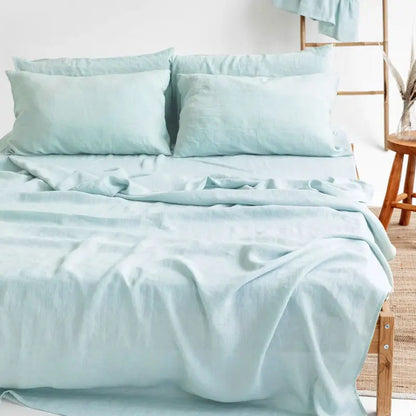 4-piece linen bed sheet set with flat sheet, deep pocket fitted sheet, and two pillowcases in natural flax color, by BACKUPMYFILESNOW.COM®.