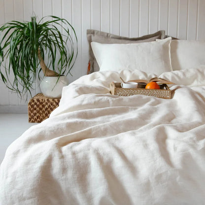 BackupMyFilesNow.com linen bed sheet set with flat sheet, deep pocket fitted sheet, and two pillowcases in natural flax color.