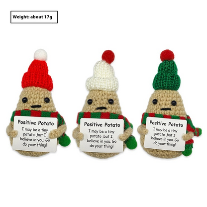 Green-hatted Christmas positive potato doll by BACKUPMYFILESNOW.COM®, featuring a cheerful face and festive holiday attire.