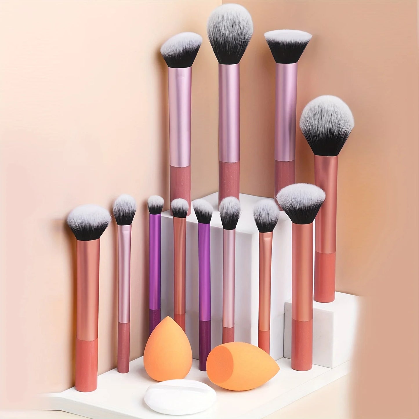 12-piece classic full makeup brush set with angled and teardrop blenders, includes powder puff, professional nylon application tools.