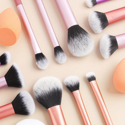 12-piece BackupMyFilesNow.com makeup brush set with angled and teardrop blenders, powder puff, nylon handles for professional application.