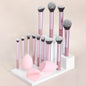 12-piece BackupMyFilesNow.com makeup brush set with angled, teardrop blenders and powder puff for professional cosmetic application.
