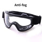 Clear fog-proof safety goggles with black frame, anti-splash and dust-proof design, suitable for lab work, research, and riding.