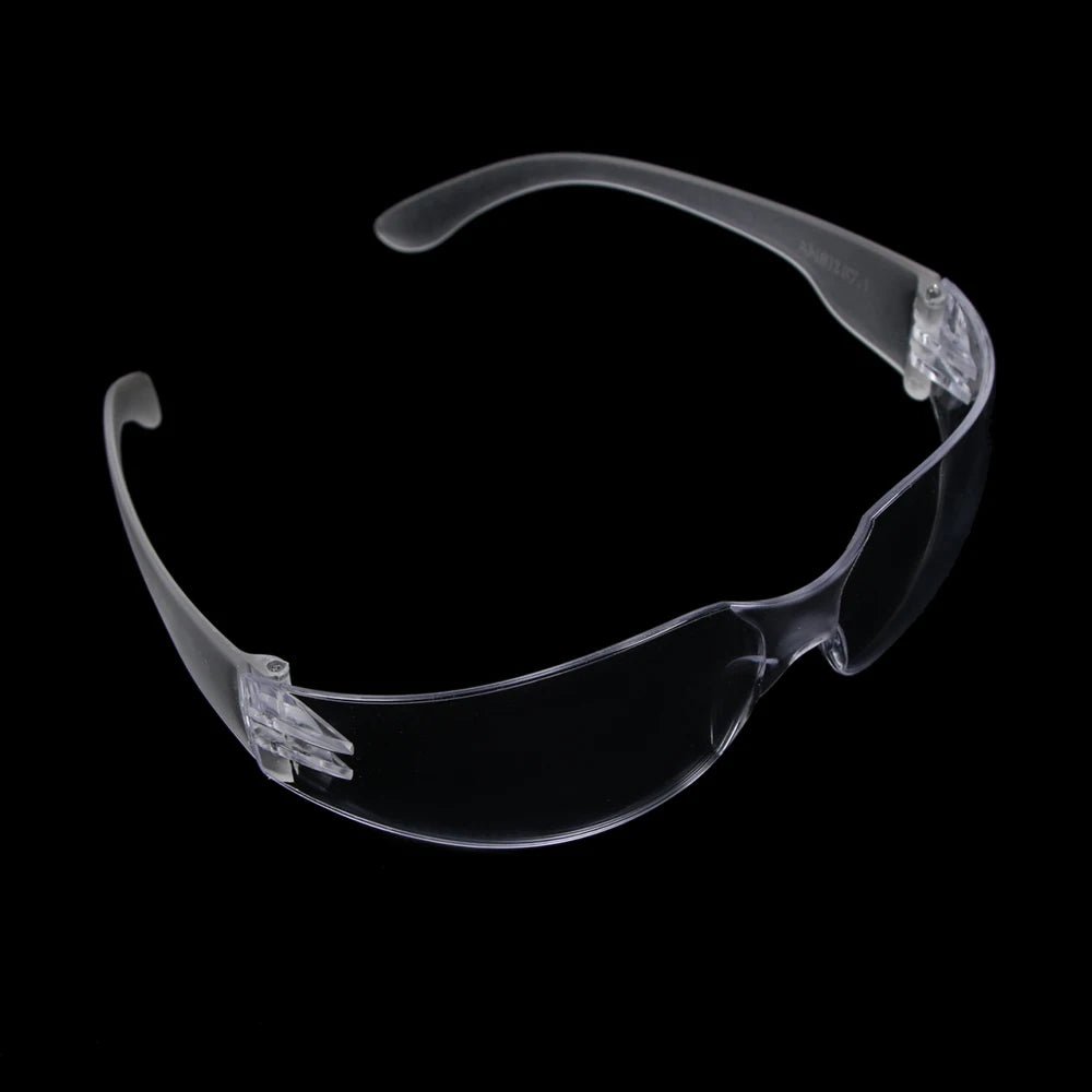 Clear safety goggles with vented design and anti-fog coating, providing protective eyewear for lab or industrial use.