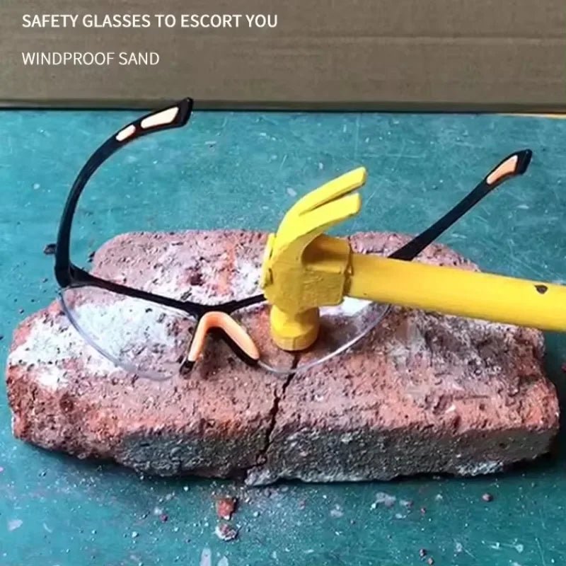 Grey cycling goggles by BACKUPMYFILESNOW.COM® with windproof, sandproof, anti-splash vents, designed for outdoor riding and lab safety.