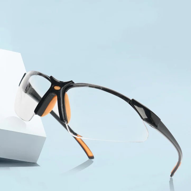 Grey cycling goggles with windproof, sandproof, anti-splash vents, suitable for outdoor riding, lab work, and safety protection.