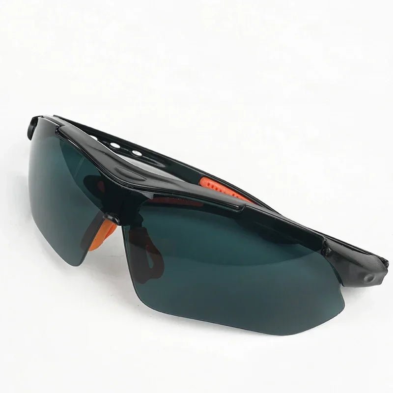 Grey cycling goggles by BACKUPMYFILESNOW.COM® with windproof, sandproof, anti-splash vents for outdoor safety and lab use.