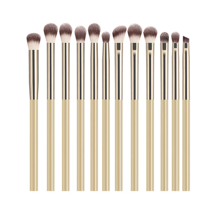 12-piece eyeshadow makeup brush set with soft synthetic hair including blending, shader, angled, and liner brushes for eye makeup.