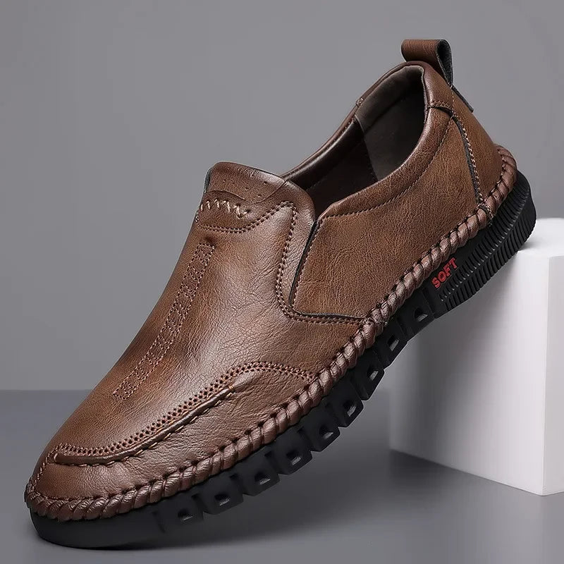 Men's coffee-colored genuine leather slip-on shoes by BackupMyFilesNow.com, featuring hand stitching for formal, wedding, and leisure occasions.