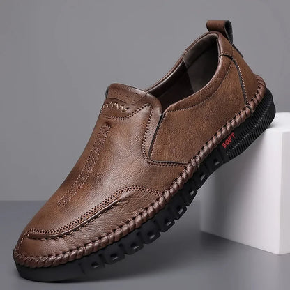 Men's coffee-colored genuine leather slip-on shoes by BackupMyFilesNow.com, featuring hand stitching for formal, wedding, and leisure occasions.
