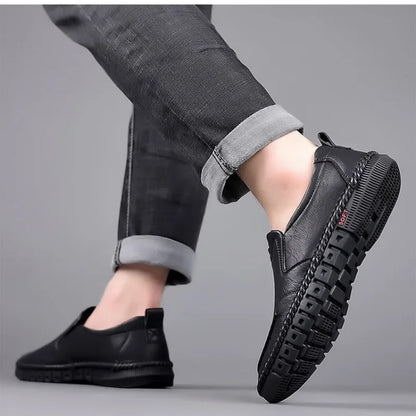 Men's coffee-colored genuine leather slip-on shoes by BackupMyFilesNow.com, featuring hand stitching for formal and casual occasions.