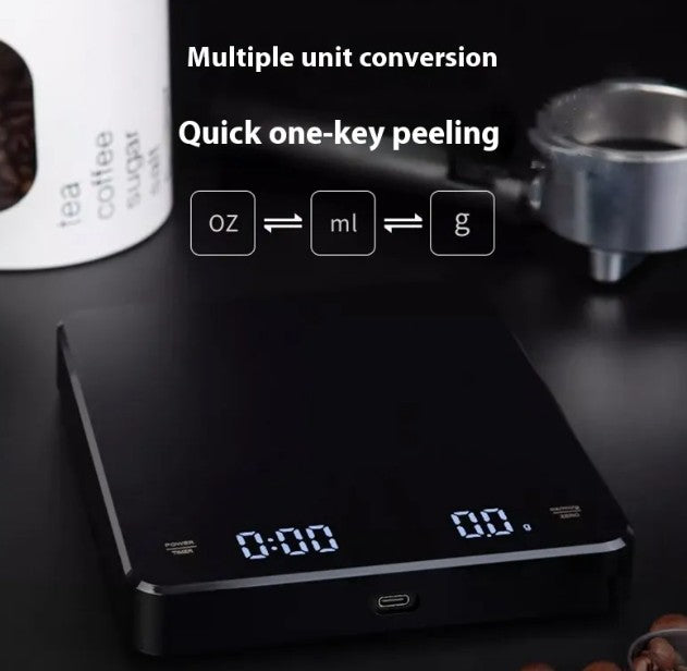 Digital coffee scale by BACKUPMYFILESNOW.COM® with a sleek design, digital display, and measurement buttons on a white background.