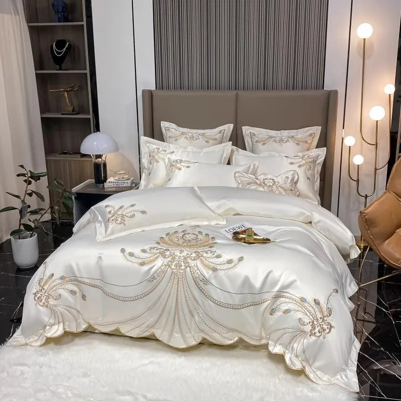 White and gray satin cotton bedding set with gold embroidery, including fitted sheets, pillowcases, and comforter covers for king and queen sizes.