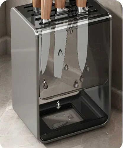 Gray kitchen accessories organizer with no-punch wall-mounted carbon steel knife rack and stand holder for safe knife storage.
