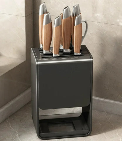 Grey kitchen accessories organizer with wall-mounted knife rack and drainable carbon steel holder for safe, convenient knife storage.