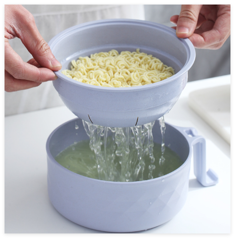 Cream ramen bowl with draining cup by BACKUPMYFILESNOW.COM®, featuring a Japanese-style ceramic design for serving noodles.