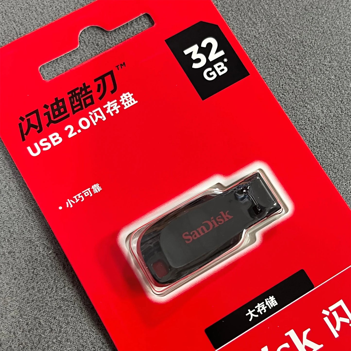 SanDisk Super Mini USB 2.0 flash drive in various storage sizes, compact pen drive for computers, TV, and car audio.