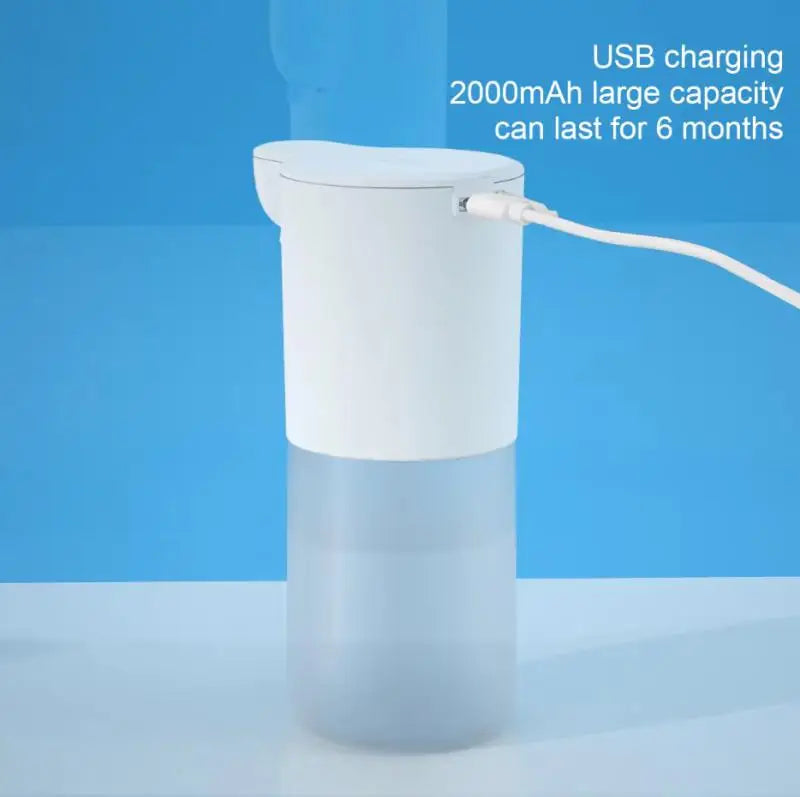 USB charging automatic foam soap dispenser with infrared touchless sensor, compact design for kitchen or bathroom use.