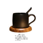 Nordic-style frosted ceramic coffee mug with wooden base and spoon tray, black coffee cup from BackupMyFilesNow.com
