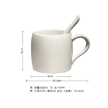 Nordic frosted ceramic coffee mug with wooden base and spoon tray, black coffee cup from BackupMyFilesNow.com.