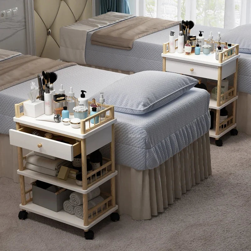 Modern solid wood salon trolley with multiple compartments for barber shop tools and storage, on wheels for easy mobility.