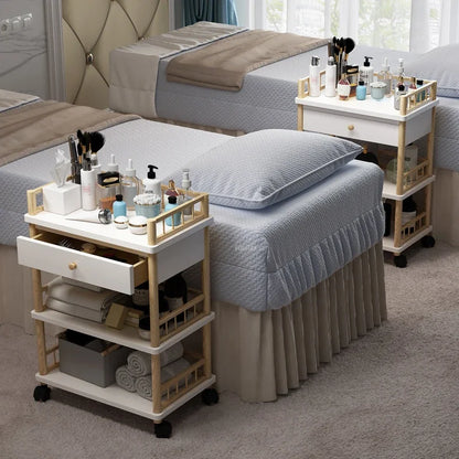 Modern solid wood salon trolley with multiple compartments for barber shop tools and storage, on wheels for easy mobility.
