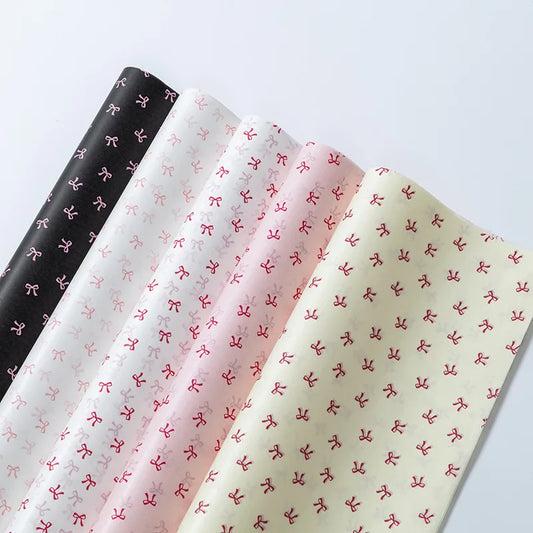 Elegant pearl paper with bow accents, premium gift wrapping material from BackupMyFilesNow.com, perfect for stylish Instagram-style packaging.
