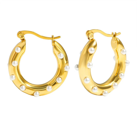 Gold stainless steel hoop earrings with shiny zircon accents, trendy geometric circle design for women jewelry.