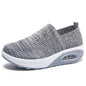 Dark blue vulcanized platform sneakers for women, casual breathable flat shoes with solid color design and comfortable walking soles.