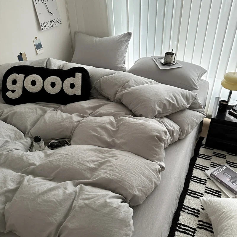 Dark blue king-size cotton bed linen set with duvet cover and pillowcases, ideal for single, couple, or double beds.