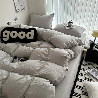 Dark blue king-size cotton bed linen set with duvet cover and pillowcases, ideal for single, couple, or double beds.
