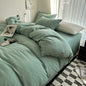 Dark blue solid cotton bedding set with duvet cover and pillowcases, king size, designed for single, double, or queen beds.