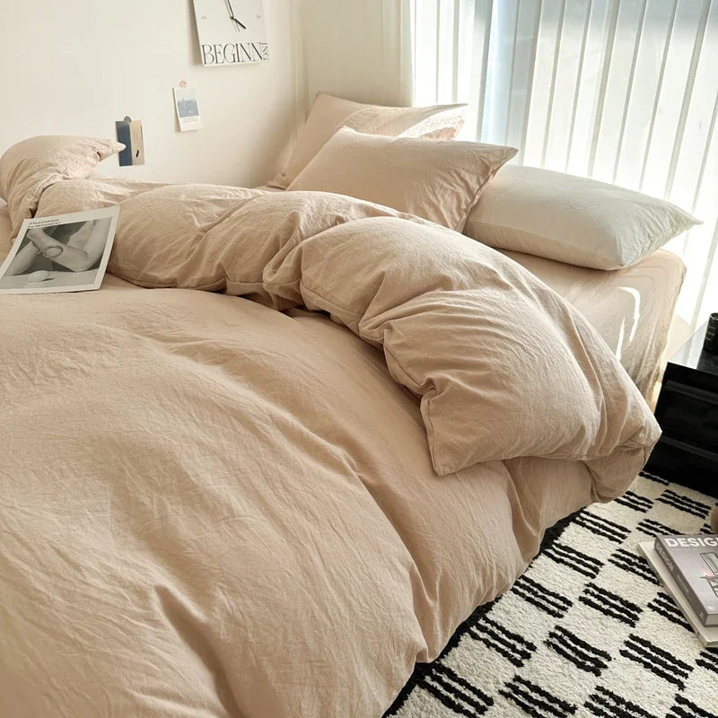Dark blue solid cotton bed linen set with duvet cover and pillowcases, suitable for king, queen, double, or twin beds.