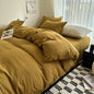 Dark blue king-size solid cotton bed linen set with duvet cover and pillowcases, suitable for single, couple, or double beds.