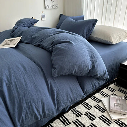 Dark blue king-size cotton bedding set with duvet cover and pillowcases, featuring solid bed linen for single, double, and twin beds.