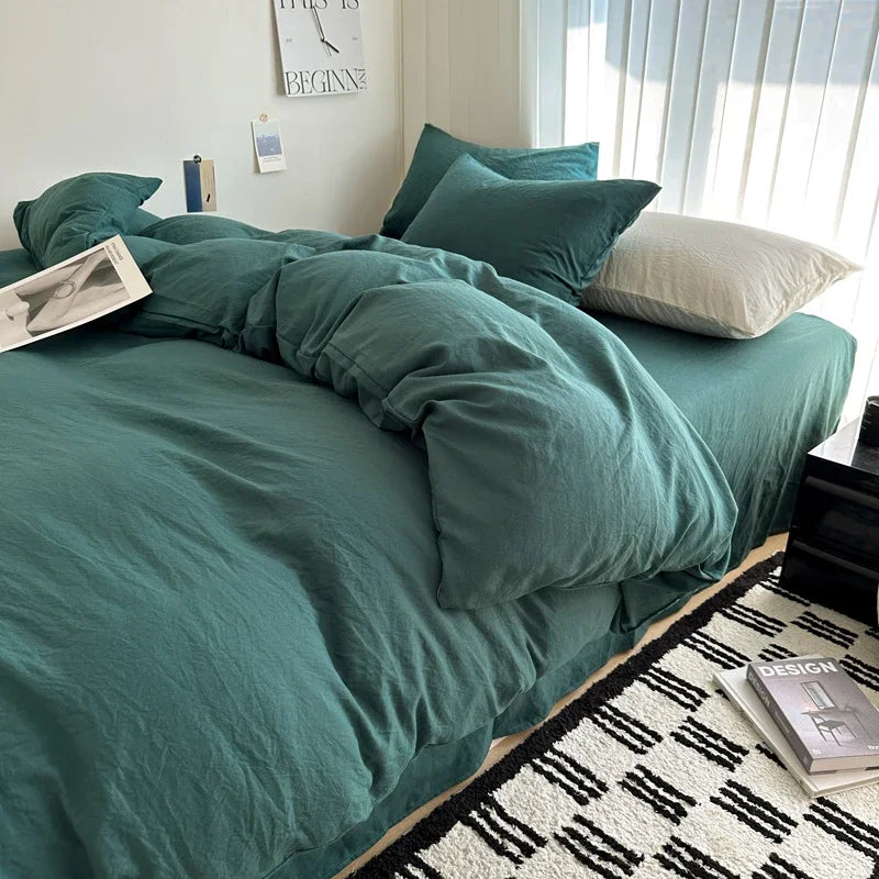 Dark blue king-size cotton bedding set with sheet, duvet cover, and pillowcases, ideal for single, couple, or double beds.