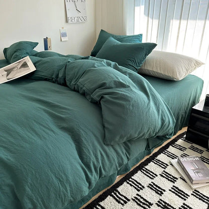 Dark blue king-size cotton bedding set with sheet, duvet cover, and pillowcases, ideal for single, couple, or double beds.