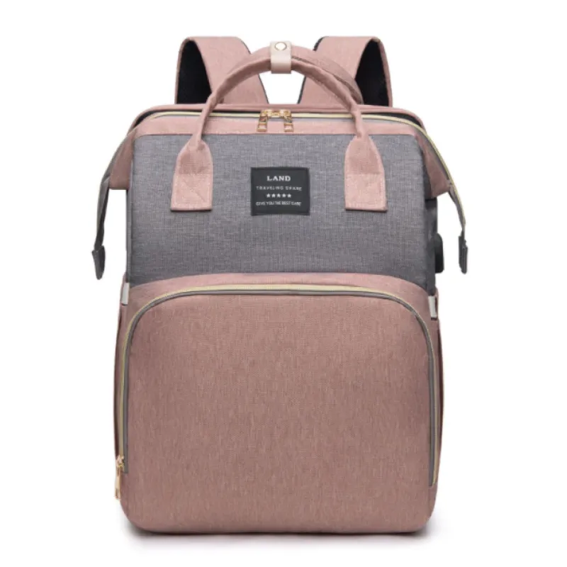 Dark blue large-capacity mommy bag by BackupMyFilesNow.com with multiple compartments and adjustable straps, designed for moms on the go.
