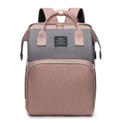 Dark blue large-capacity mommy bag by BackupMyFilesNow.com with multiple compartments and adjustable straps, designed for moms on the go.