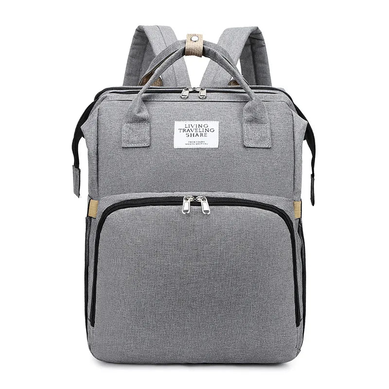 Dark blue large-capacity mommy bag by BackupMyFilesNow.com with multiple compartments and adjustable straps for parent essentials.