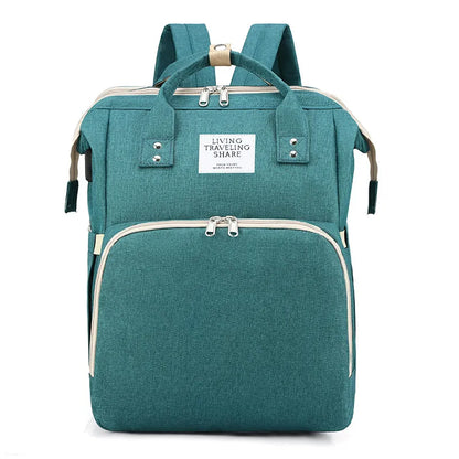 Dark blue large-capacity mommy bag with multiple compartments and handles, designed for organizing baby essentials.