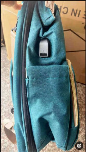 Dark blue large-capacity mommy bag with multiple pockets and adjustable straps, designed by BackupMyFilesNow.com.