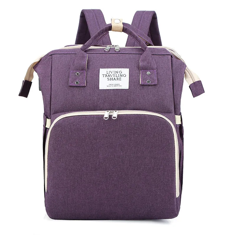 Dark blue large-capacity mommy bag from BackupMyFilesNow.com with multiple compartments and adjustable straps for moms on the go.