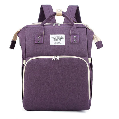 Dark blue large-capacity mommy bag from BackupMyFilesNow.com with multiple compartments and adjustable straps for moms on the go.